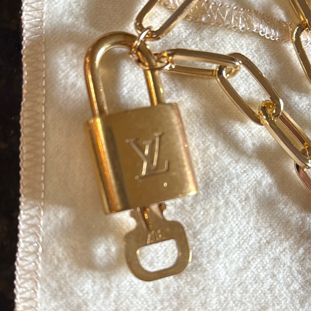 Authentic Louis Vuitton Lock & Key with Gold Tone Chain Necklace - Picture 6 of 13